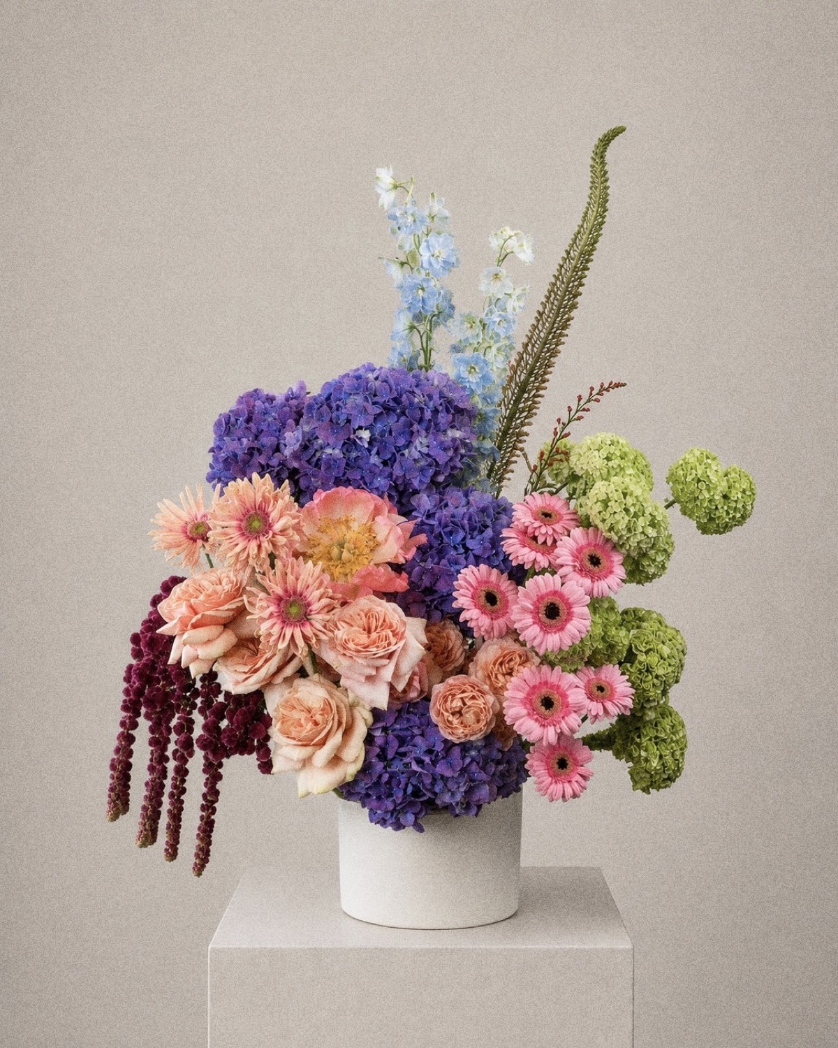 The Lovina — violet hydrangea and peach rose arrangement by Maison Bloom, Bali